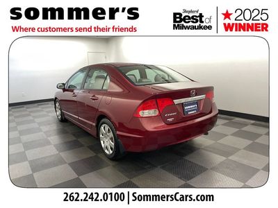 2009 Honda Civic Sdn — rear three-quarter view