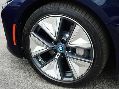 2023 BMW i4 — rear three-quarter view