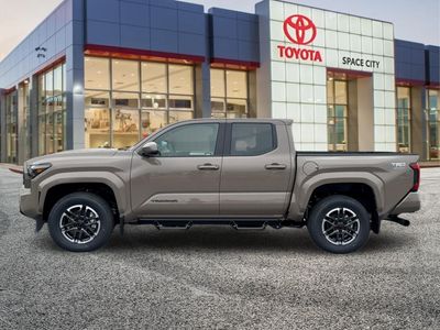 2026 Toyota Tacoma — rear three-quarter view