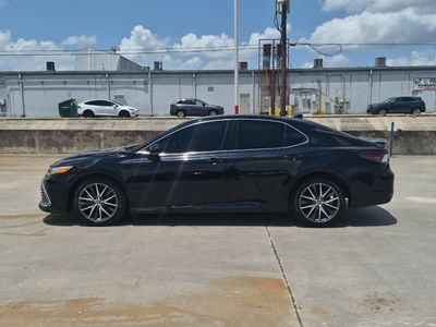 2024 Toyota Camry — rear three-quarter view