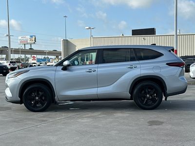 2025 Toyota Highlander — rear three-quarter view