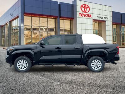 2026 Toyota Tacoma — rear three-quarter view