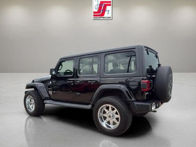 2019 Jeep Wrangler Unlimited — rear three-quarter view