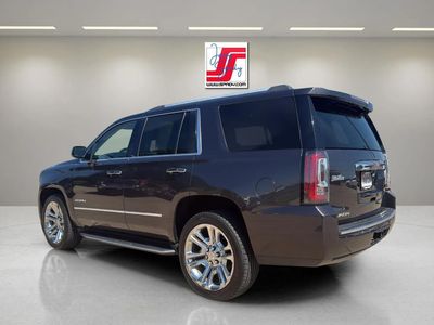 2016 GMC Yukon — rear three-quarter view