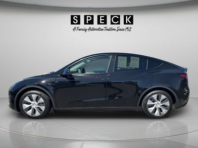 2024 Tesla Model Y — side profile view