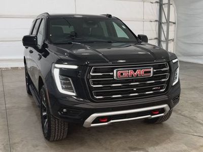 2026 GMC Yukon — rear three-quarter view