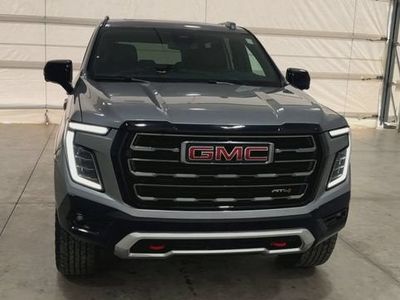 2026 GMC Yukon — rear three-quarter view