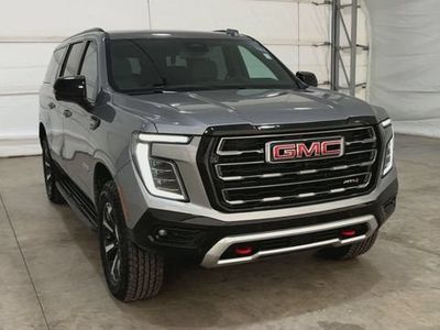 2026 GMC Yukon XL — rear three-quarter view