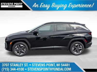 2026 Hyundai Tucson Hybrid — rear three-quarter view