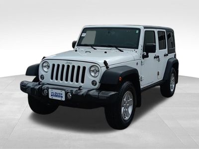 2018 Jeep Wrangler JK — rear three-quarter view
