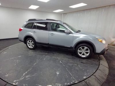 2013 Subaru Outback — rear three-quarter view