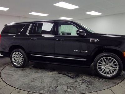 2026 GMC Yukon XL — rear three-quarter view