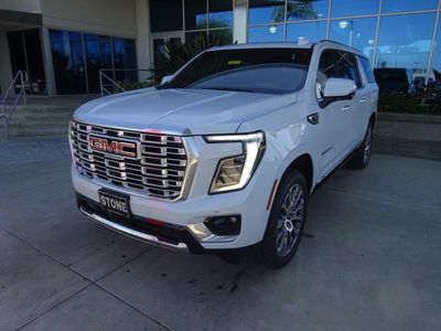 2026 GMC Yukon XL — rear three-quarter view