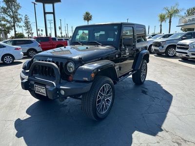 2009 Jeep Wrangler — rear three-quarter view