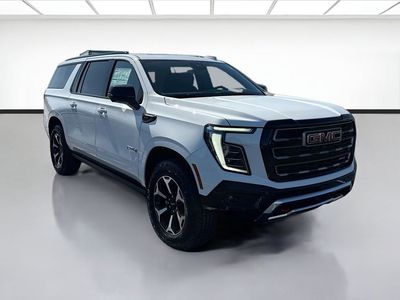 2026 GMC Yukon XL — rear three-quarter view