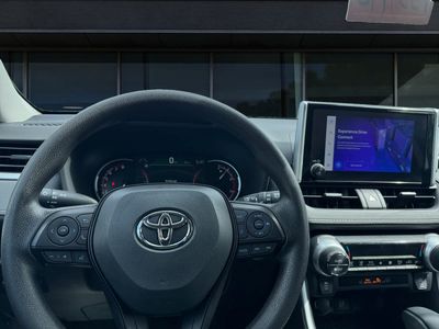 2025 Toyota RAV4 — rear three-quarter view