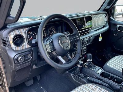 2026 Jeep Wrangler — rear three-quarter view