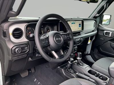2026 Jeep Wrangler — rear three-quarter view