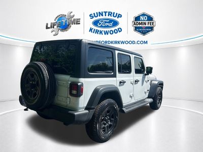 2022 Jeep Wrangler — rear three-quarter view