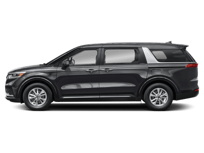 2024 Kia Carnival — rear three-quarter view