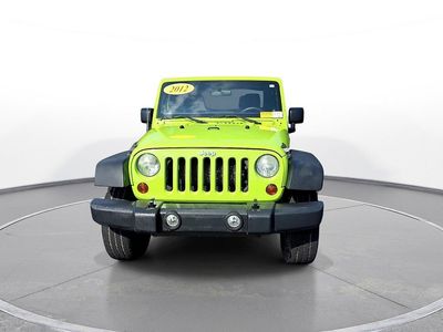 2012 Jeep Wrangler — rear three-quarter view