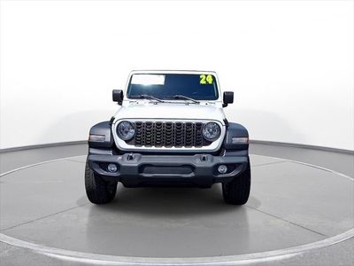 2024 Jeep Wrangler — rear three-quarter view