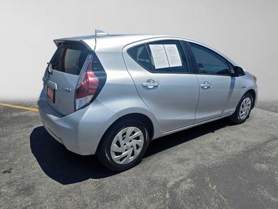 2016 Toyota Prius c — rear three-quarter view