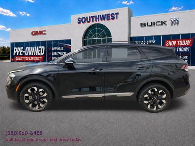 2023 Kia Sportage — rear three-quarter view