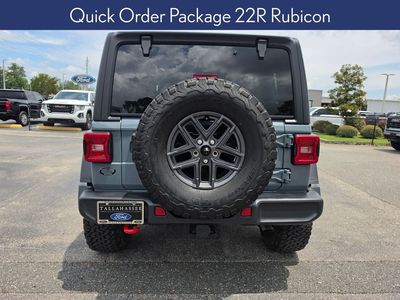 2024 Jeep Wrangler — rear three-quarter view