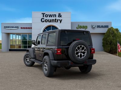 2026 Jeep Wrangler — rear three-quarter view