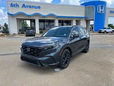 2026 Honda CR-V Hybrid Sport-L in Crystal Black Pearl — front three-quarter view