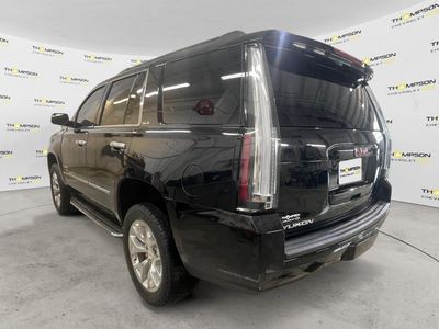 2016 GMC Yukon — rear three-quarter view