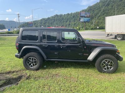 2024 Jeep Wrangler — rear three-quarter view
