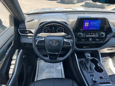 2025 Toyota Highlander — rear three-quarter view