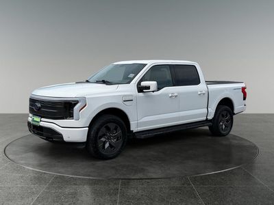 2023 Ford F-150 Lightning — rear three-quarter view