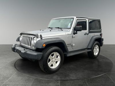 2016 Jeep Wrangler — rear three-quarter view