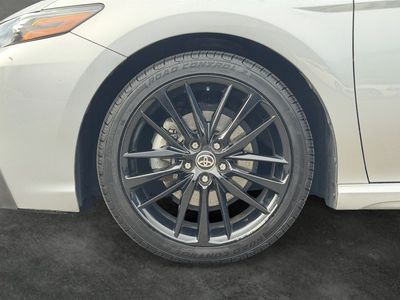 2021 Toyota Camry — rear three-quarter view