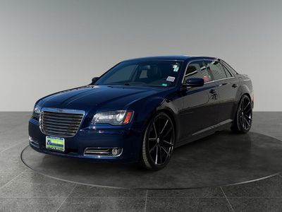 2014 Chrysler 300 — rear three-quarter view