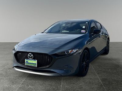 2024 Mazda Mazda3 — rear three-quarter view