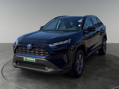 2024 Toyota RAV4 Hybrid — rear three-quarter view
