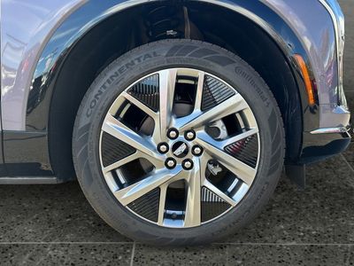 2025 Cadillac OPTIQ — rear three-quarter view