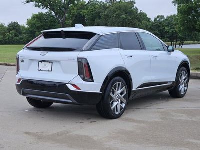 2026 Cadillac OPTIQ — rear three-quarter view