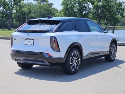 2026 Cadillac OPTIQ — rear three-quarter view