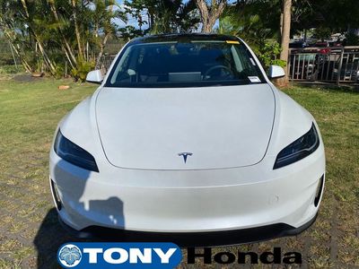 2024 Tesla Model 3 — side profile view