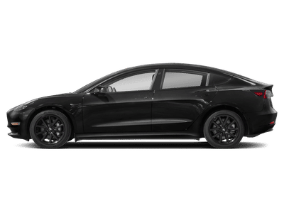 2021 Tesla Model 3 — rear three-quarter view