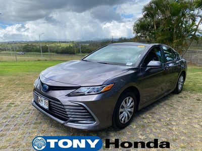 2024 Toyota Camry Hybrid — rear three-quarter view