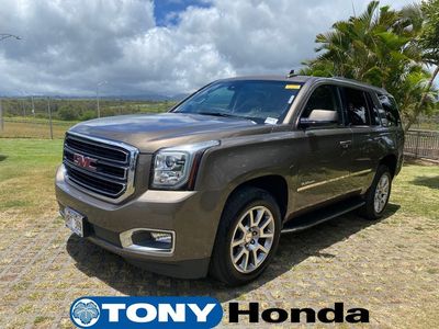 2016 GMC Yukon — rear three-quarter view
