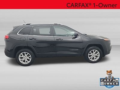 2014 Jeep Cherokee — rear three-quarter view