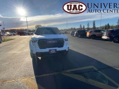 2026 GMC Acadia — rear three-quarter view