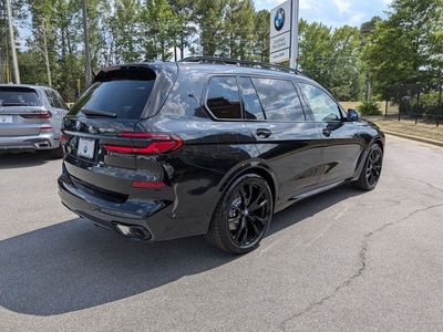 2027 BMW X7 — rear three-quarter view